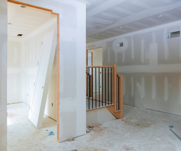 walls-plasterboards-with-room-under-construction-with-finishing-putty-in-the-room.jpg